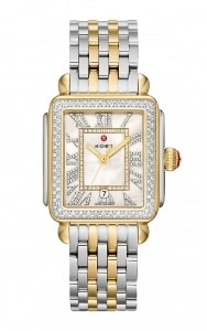 a rectangular watch with diamond accents and mixed metal details.