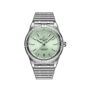 A Breitling watch with a mint green dial and diamond accents.