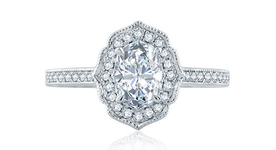 An A.JAFFE engagement ring with an oval center stone and Art Deco silhouette, available at Gerald Peters.