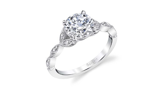 A white gold Sylvie engagement ring with vine details and a round cut center, available at Gerald Peters.