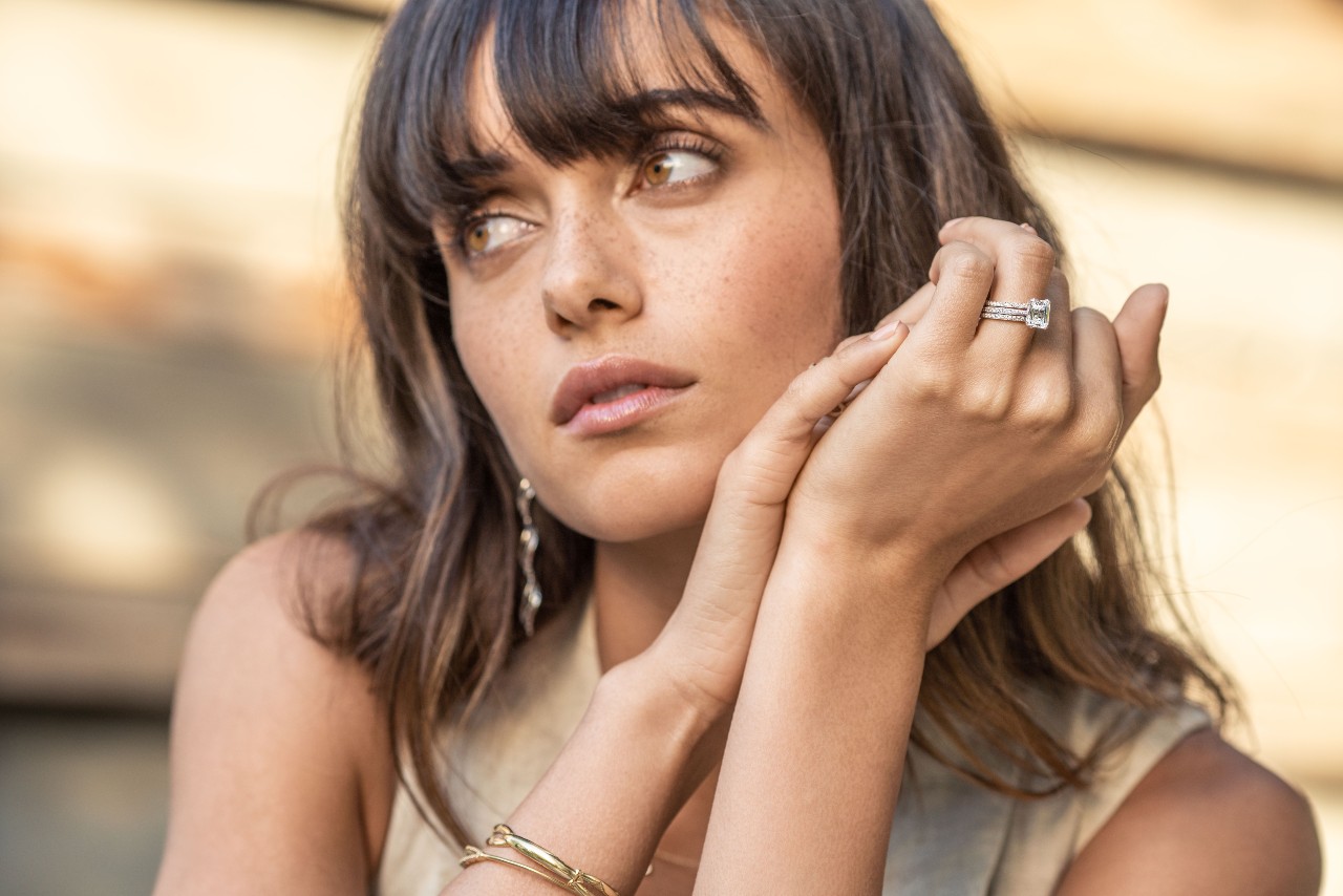 a lady wearing a TACORI engagement ring