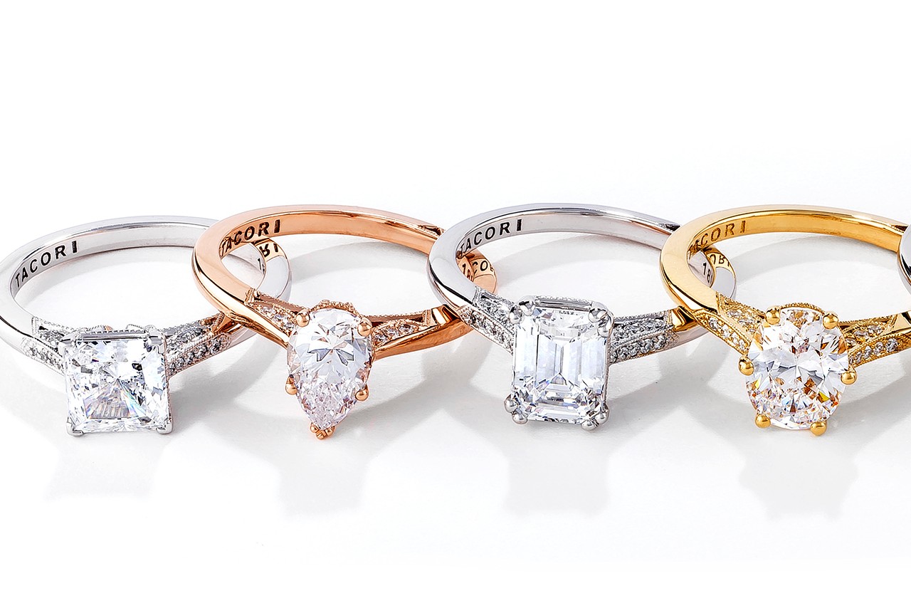 a collection of diamond engagement rings by TACORI